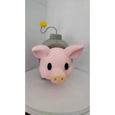 Imagem de Brinquedo Articulado Svinino Bombombino, Pelúcia Rosa, Design Porquinho, com Detalhes em Amarelo e Cinza