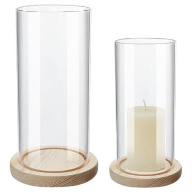 Imagem de WEBEEDY 2 conjuntos de castiçais de pilar de vidro transparente com bandeja de madeira, 2 tamanhos, design cilíndrico clássico à prova de vento para decoração de mesa de casamento, Natal, centro de