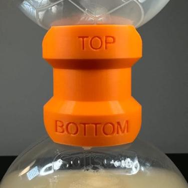 Imagem de Dispensador inteligente à prova de vazamento de tempo | 1 peça de plástico para lavar as mãos, xampu, gel de banho - Diga adeus ao desperdício, Laranja