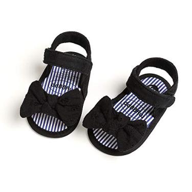 Imagem de GDSDYM Sandálias de verão para bebês meninas com laço de flor, sola macia, sapatos rasteirinhos, para recém-nascidos, primeiros andadores, berço, 07 Preto, 12-18 Months Toddler