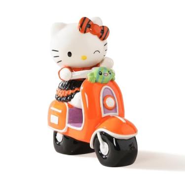 Imagem de Blue Sky Clayworks Hello Kitty Estatueta de scooter laranja de Halloween, 15,5 cm C x 8,5 cm L x 17 cm A criada