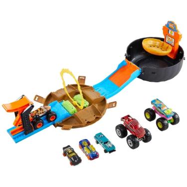 Imagem de Conjunto de Monster Trucks com Pista Transformável, Inclui 3 Caminhões e 4 Carros, Hot Wheels.