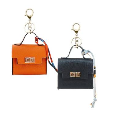 Imagem de YJUBAOA Pacote com 2 minimochilas, chaveiros, bolsas minúsculas de couro PU para bolsa, bolso para batom, porta-cartões, organizador de cabos de dados, bolsa organizadora laranja e branca (laranja +