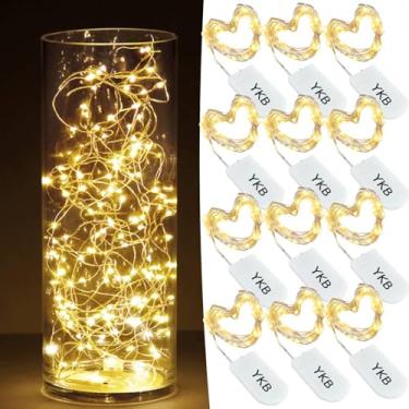 Imagem de YKB Fairy Lights Pacote com 12, luzes de corda operadas por bateria, 20 LEDs em fio de cobre de 1 m, mini luzes LED de corda de fada branca quente para festa de casamento, frasco maçonal, decoração de quarto