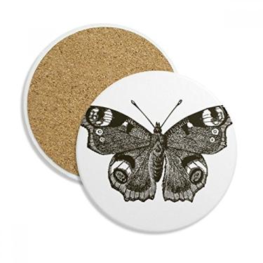 Imagem de Borboleta com asas escuras, cor escura, copo de copo, caneca de proteção de mesa, pedra absorvente