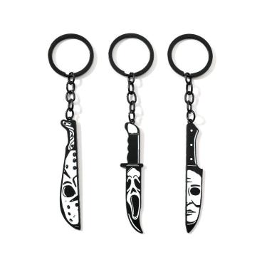 Imagem de Chaveiro de terror de Halloween em forma de faca com caveira e máscara