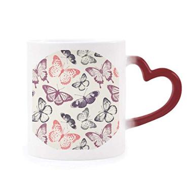 Imagem de Caneca Borboleta em fundo rosa pálido sensível ao calor Caneca vermelha muda de cor