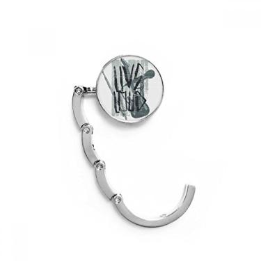 Imagem de Gancho de mesa com estampa de instrumentos musicais de jazz cinza com fecho decorativo, gancho dobrável