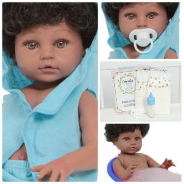 Imagem de Boneco Reborn Masculino Negro Com Chupeta Vários Acessórios - Cegonha 