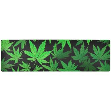 Imagem de Folha de cannabis em um tapete de tripé escuro, tapete de centro de mesa, corredor de mesa para casa
