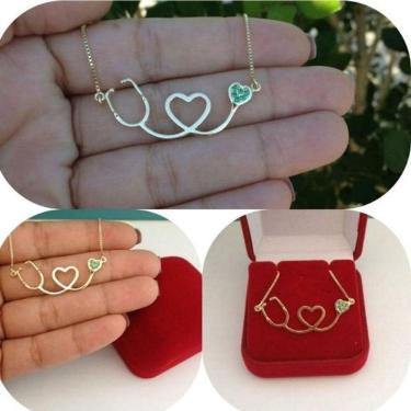 Imagem de Gargantilha Estetoscópio Com Coração E Zircônia Verde Em Banho De Ouro