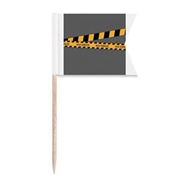Imagem de Tiras pretas e amarelas Linha de aviso de erro, bandeiras de palito, marcação de rotulagem para bolo de festa, comida e queijos