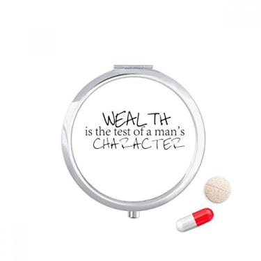 Imagem de Caixa de armazenamento de remédios com citação Wealth is The Test of A Man's Character