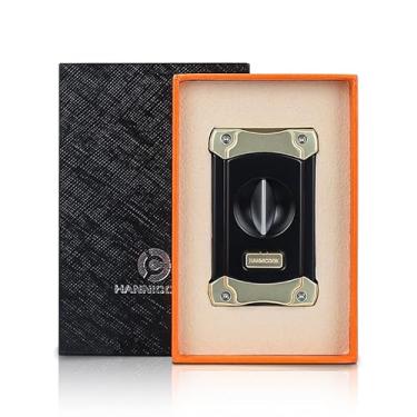 Imagem de Cortador de Charuto V-Cut Hannicook – Aço Preto com Detalhes Dourados | Compacto, Preciso e Elegante | Caixa de Presente