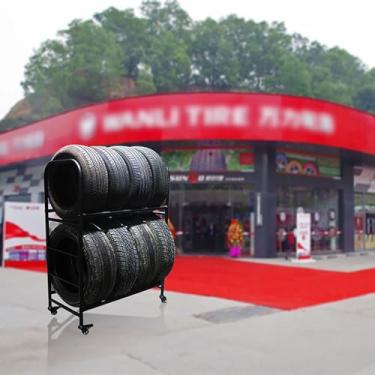 Imagem de Rack de pneu resistente para garagem – Rack de exibição de roda autônomo, comporta 8 pneus, suporte giratório de pneu sobressalente semicaminhão, suporte de pneu durável para aros