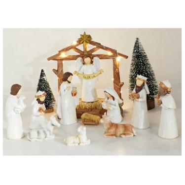 Imagem de MeritMode Conjunto de presépio branco – Estatueta da Sagrada Família de 12 peças com manjedoura iluminada, mini estatuetas decorativas de Natal religiosas pintadas à mão, conjuntos de presépio