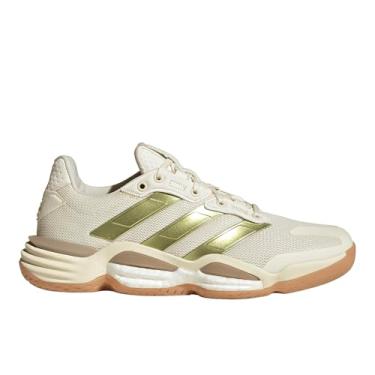 Imagem de adidas Tênis feminino Stabil 16 para uso interno, Branco esbranquiçado/dourado metálico/areia cristalina, 37