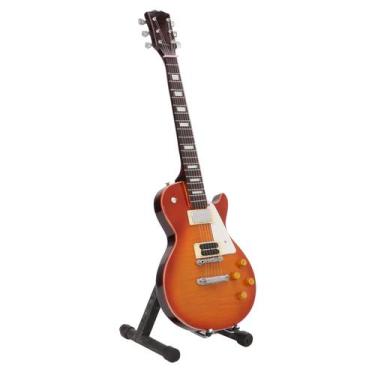 Imagem de Guitarra acústica em miniatura modelo Pssopp com decoração em tília