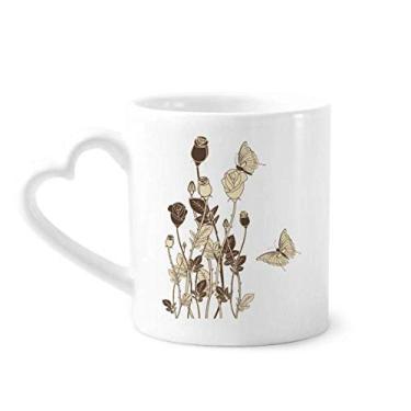 Imagem de Caneca de cerâmica de café com folhas de borboleta, flor e caneca de coração de vidro