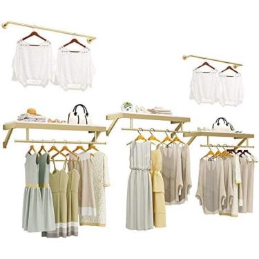 Imagem de Prateleiras De Exibição De Roupas Para Lojas De Roupas Ficam Douradas, Prateleiras De Roupas Montadas Na Parede, Prateleiras De Janela, Cabide Decorativo Na Parede, Poste De Exibição De Roupas De