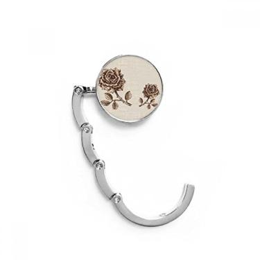 Imagem de Gancho de mesa de plantas marrom rosa antigo com fecho decorativo e gancho dobrável