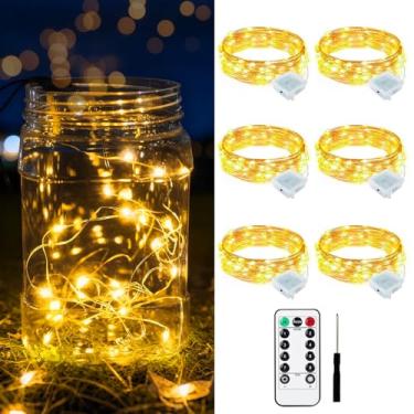 Imagem de Yooumoga Pacote com 12 luzes de fadas alimentadas por bateria com controle remoto e temporizador, 8 modos de iluminação, mini luzes de 20 LEDs para potes de pedreiro, árvores de Natal, festas e