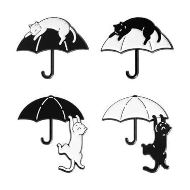 Imagem de Alfinetes de broche: gato fofo com design de guarda-chuva em preto e b
