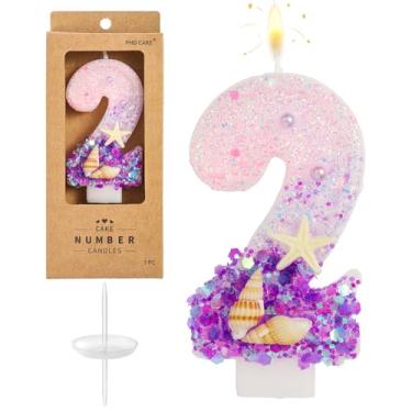 Imagem de PHD CAKE Número 2 velas roxas de aniversário na praia, celebração de festa