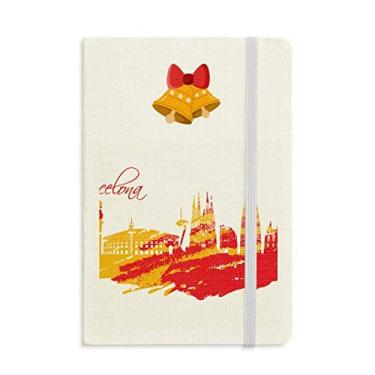 Imagem de Caderno de Barcelona vermelho e amarelo com desenho de cidade