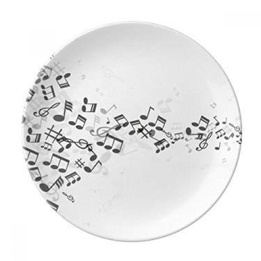 Imagem de Prato de jantar decorativo de porcelana branca com notas musicais torcidas pretas