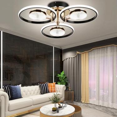Imagem de Luminária de teto LED moderna para sala de estar com design circular criativo, dimerizável de 3000k a 6500k, com controle remoto, em acrílico preto (3 anéis, 54W).