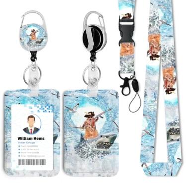 Imagem de Porta-crachá engraçado de gato surfando montando um tubarão com cordão breakaway e carretel retrátil resistente - chaveiro mosquetão giratório de 360° para mulheres, estudantes, professores