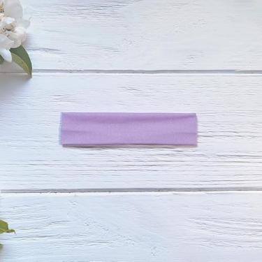 Imagem de Faixa de cabelo elástica esportiva roxa clara que absorve suor antiderrapante para corrida, ioga e fitness