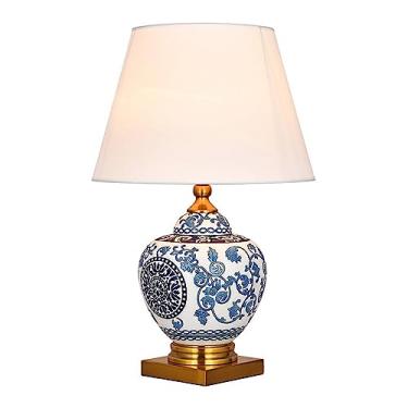 Imagem de Abajur de mesa moderno e luxuoso em cerâmica azul, com cúpula de tecido, ideal para cabeceira, sala de estar, sala de jantar e quarto.