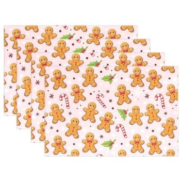 Imagem de Jogo americano de Natal para homem de gengibre rosa, conjunto de 4 tapetes de mesa de floco de neve de inverno, bengala doce, poinsétia de Natal, jogo americano de serapilheira, tapete de cozinha