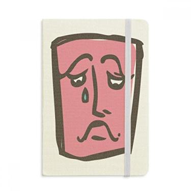 Imagem de Caderno com desenho de rosto abstrato triste feliz com capa dura em tecido