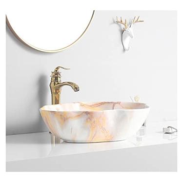 Imagem de Lavatório de cerâmica para pia de banheiro com textura de mármore arte oval acima do balcão lavatório com torneira dourada e pia de vaso de drenagem