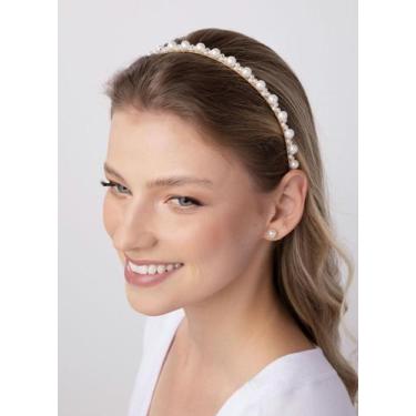 Imagem de tiara de perola delicada e estilosa na cor clara para uso infantil a a