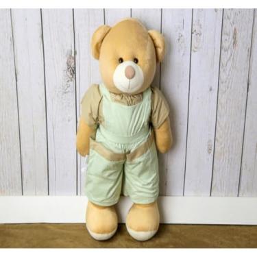 Imagem de URSO DE PELUCIA PORTA FRALDAS - MACAÇAO 65 CM PARA QUARTO DE BEBE (XADREZ DE VERDE)