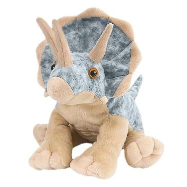 Imagem de Bebê enchido dinossauro do brinquedo do luxuoso que joga com a boneca 