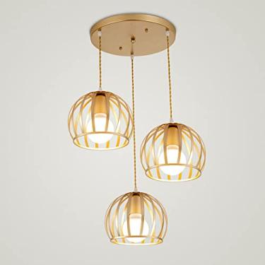 Imagem de YQSLQZZ Lanterna oca lustre de sala de jantar, luz de teto ajustável minimalista pós-moderna, luz E27*3 luz dourada fosca luminária decorativa interna