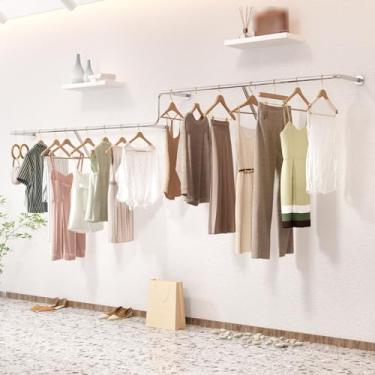 Imagem de Suporte de parede para roupas, moderno cabideiro de prata comercial para roupas, rack de exibição de tecido para boutiques de varejo, vara de pendurar multiuso resistente para armazenamento do sistema