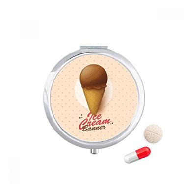 Imagem de Caixa de comprimidos de chocolate marrom com casquinhas de sorvete e bolso para remédios