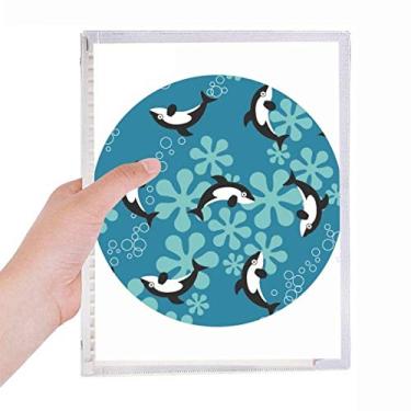 Imagem de Caderno de folhas soltas com desenho de golfinhos e ondas azuis
