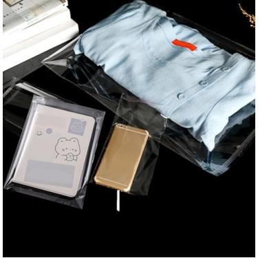 Imagem de 100 sacos plásticos transparentes de celofane autovedante para roupas, festas, casamentos (transparentes)