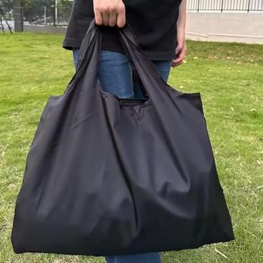 Imagem de Bolsa de compras dobrável de grande capacidade, design compacto e leve com alças confortáveis para viagens, academia e uso diário, preta