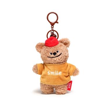 Imagem de Chaveiro de pelúcia sorrindo com chapéu vermelho e capuz amarelo