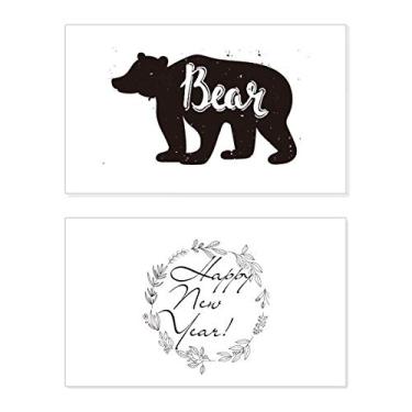 Imagem de Urso preto e branco animal ano novo cartão felicitações mensagem presente