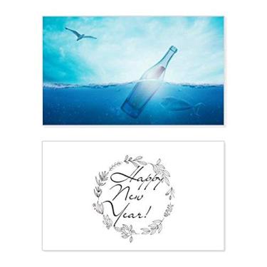 Imagem de Garrafa de vidro do oceano, ciência, natureza, ano novo, cartão de felicitações, mensagem de abençoar presente