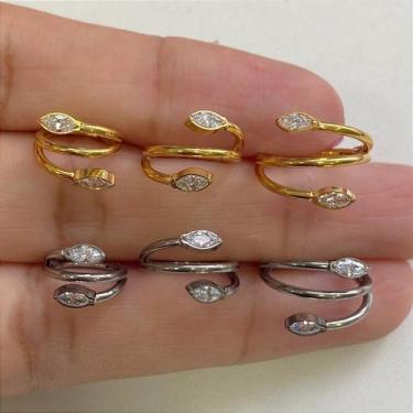 Imagem de Argola titânio twist drop clicker com zircônias dourada - no-brand